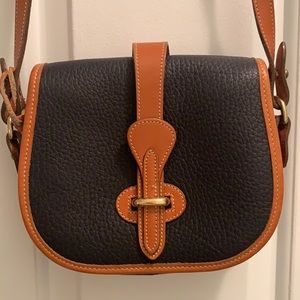 Dooney & Bourke Navy Blue Pebble leather bag.